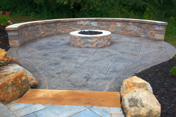 Techo Bloc Firepit and Seatwall on Stamped Concrete Patio